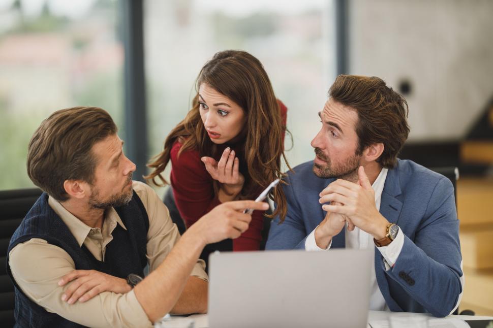 Business meeting with NYC team resolving a workplace dispute