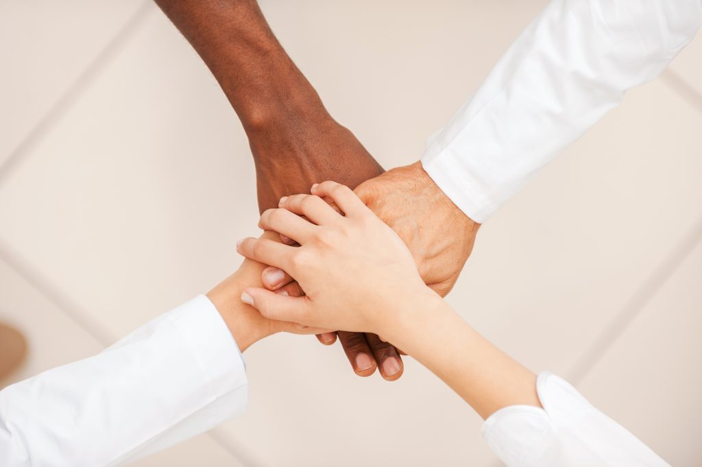 Professional team building trust and collaboration in NYC